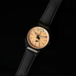 Blacked-out Purdue Boilermakers watch with gold dial and Motion P in a black PVD case