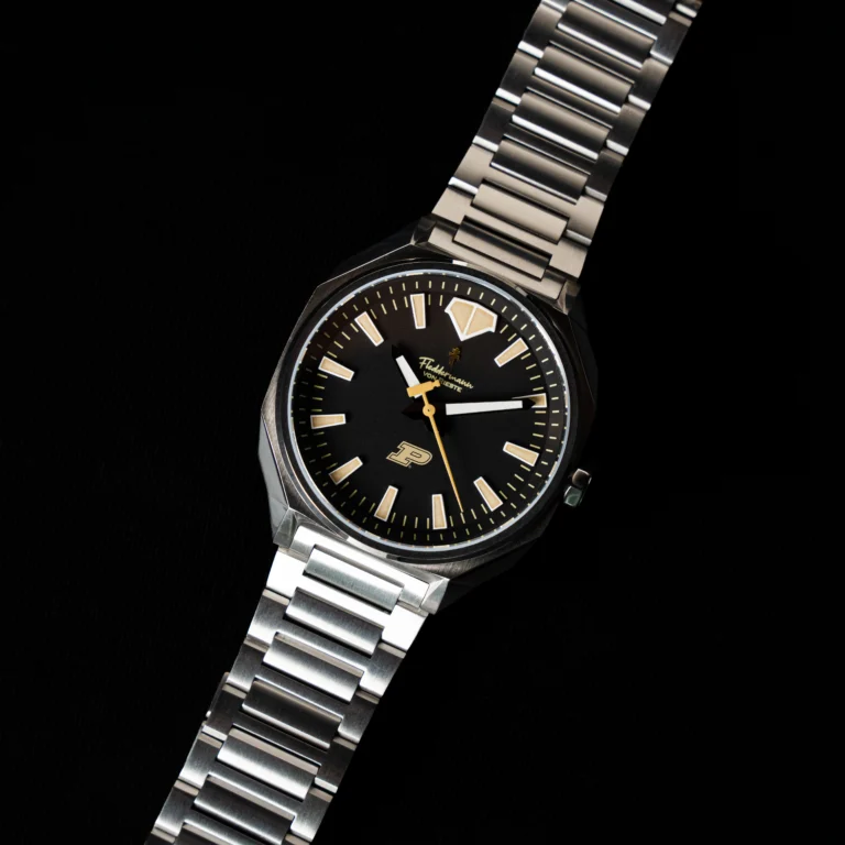 Purdue Boilermaker watch with black dial and gold Motion P in a polished 316 stainless steel case