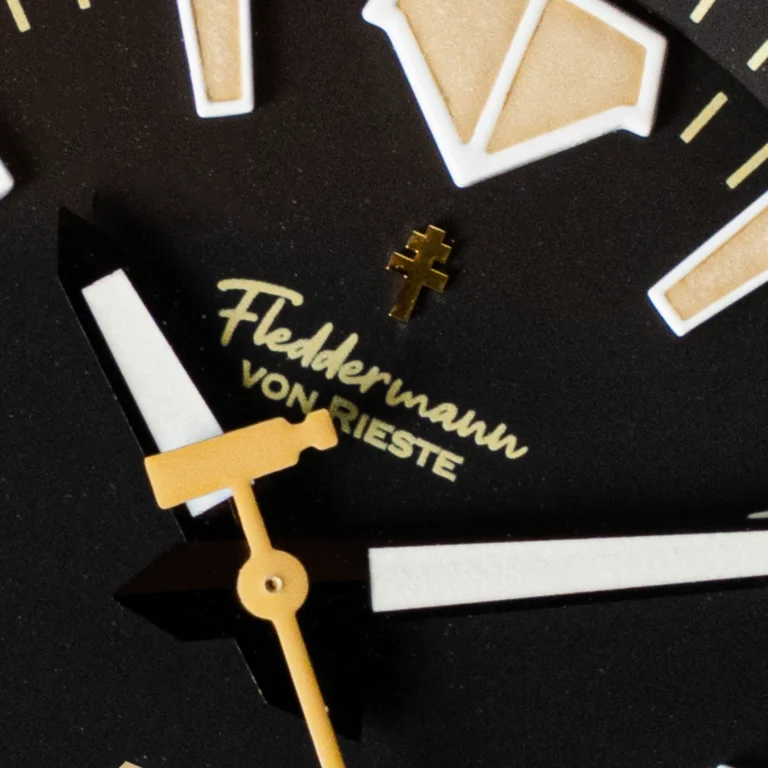 Purdue Boilermaker watch with black dial and gold Motion P in a polished 316 stainless steel case